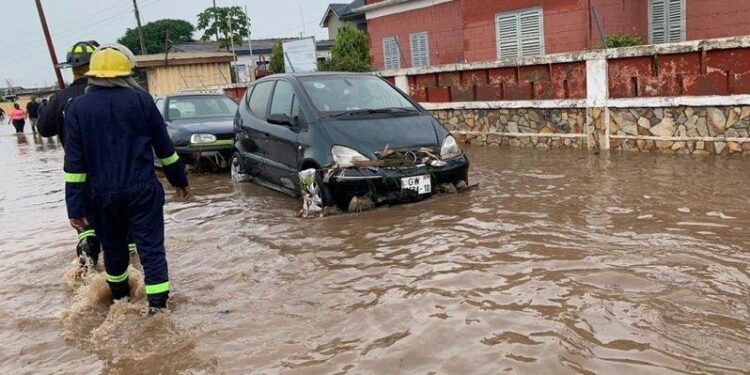 A teenage girl's body was retrieved from a submerged vehicle after the Accra floods