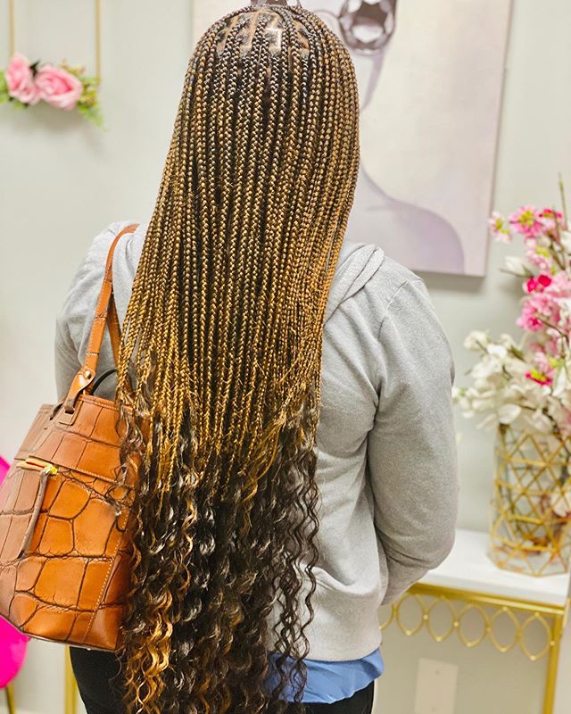 Black-gold braids with curly tips 