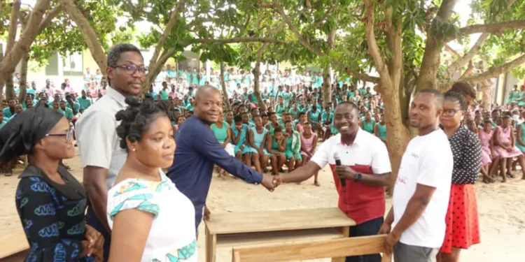 MCE for Keta Donates Desks and Water Tanks to Anlo-Afiadenyigba SHS