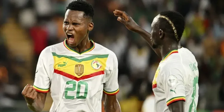 Senegal qualifies for knockout stage with a hard-fought 2-1victory over Cameroon