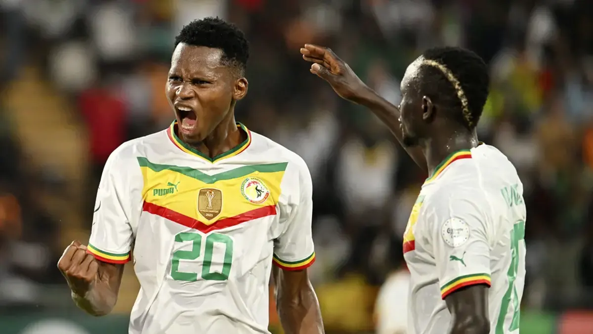 Senegal qualifies for knockout stage with a hard-fought 2-1victory over Cameroon