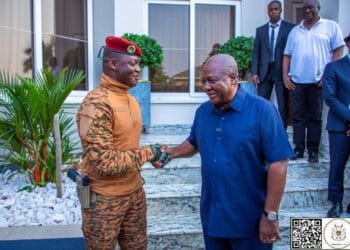 Democracy with a Revolution forehead