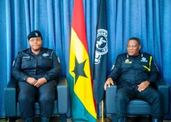 IGP Christian Tetteh Yohuno promotes Anyah District police officers Patience Kotoka and Joseph Akondoh for foiling Ablekuma Borkorborkor fuel tanker robbery and arresting 7 suspects