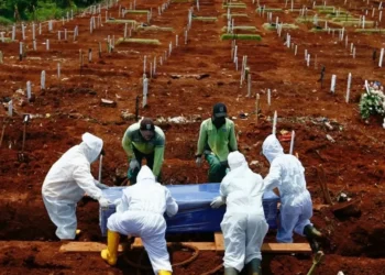 Ada East conducts mass burial for eight unidentified bodies after 15 years in mortuary