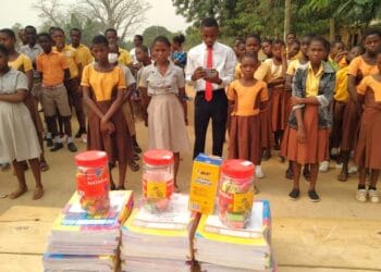 Champions Susu Enterprise donates educational items to pupils in Akatsi South