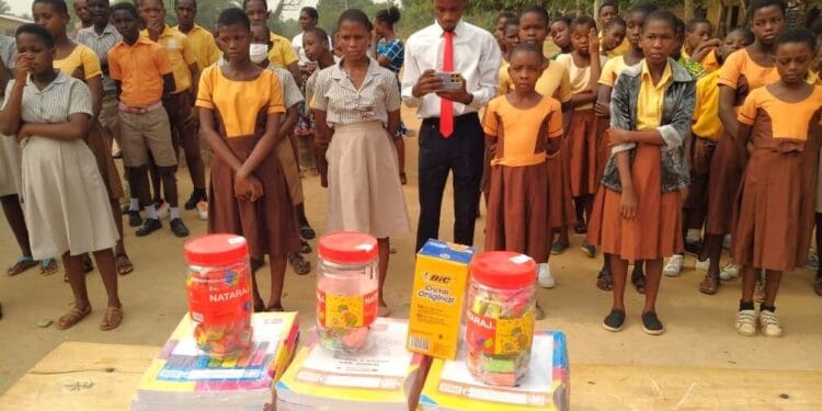 Champions Susu Enterprise donates educational items to pupils in Akatsi South