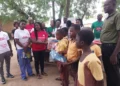 Consortium of NGOs presents educational materials to Have Fiakpokorpe M/A Basic School in Akatsi South