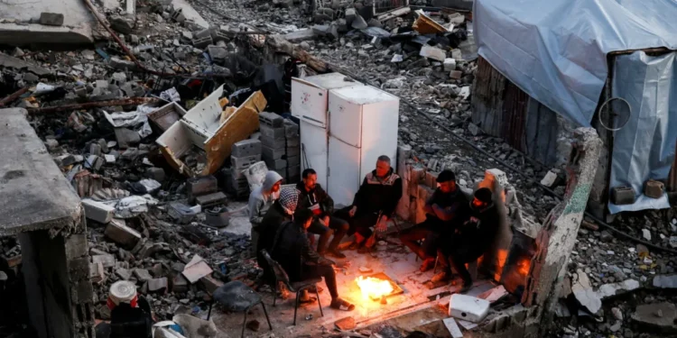 Displaced Palestinians in Gaza break fast amid devastation