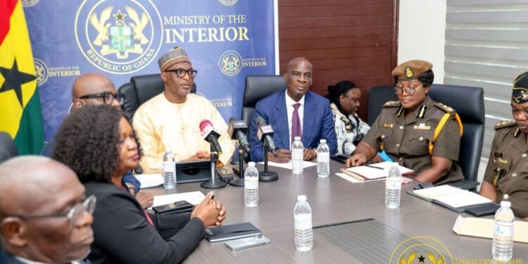 Officials from the Ministry of the Interior (Ghana) at a press briefing